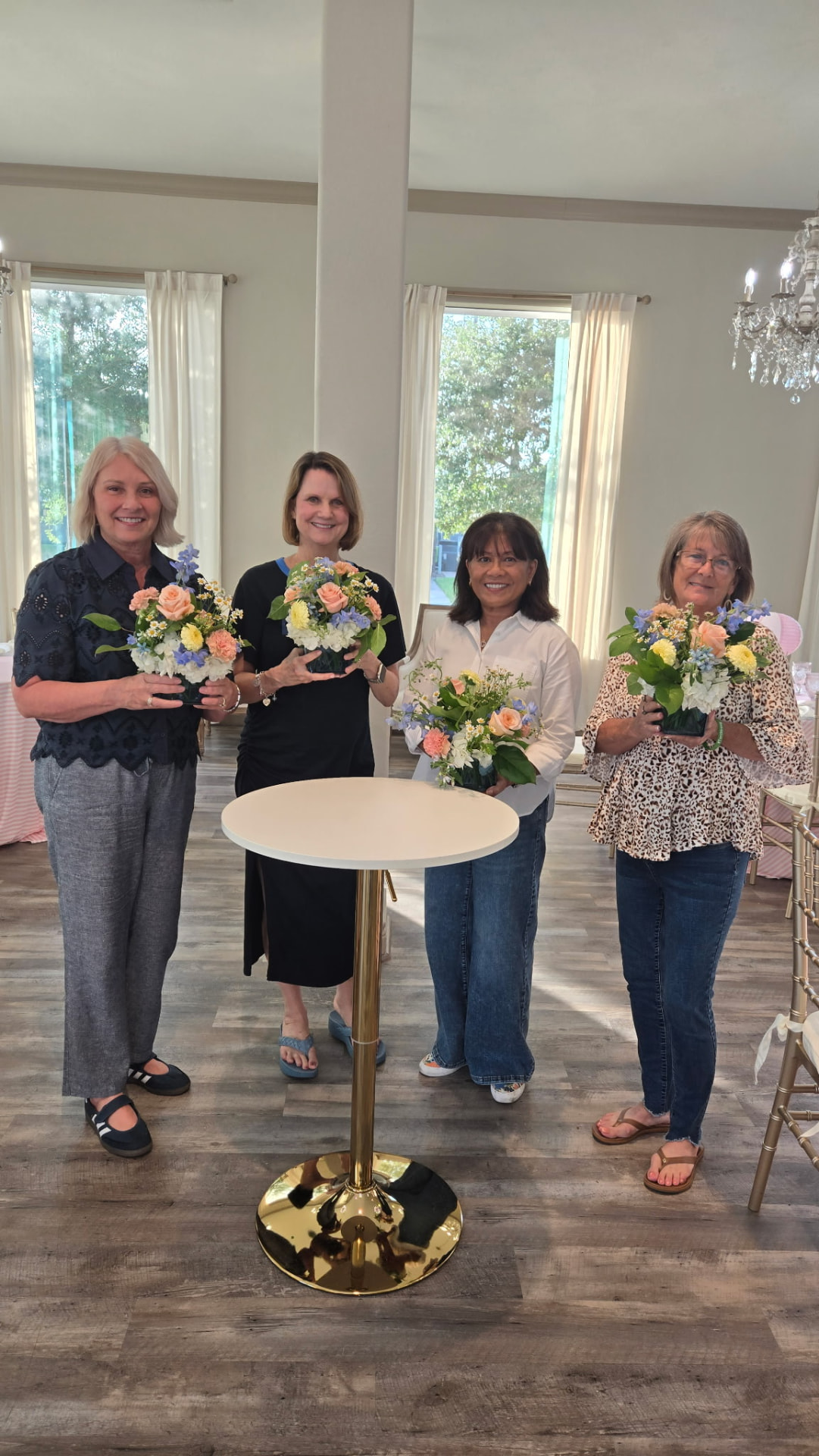 Wildflower Grace workshop attendees arranging flowers together